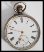 A vintage 20th century silver pocket watch stamped 835 to interior. The enamel face having a roman