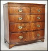 A Georgian 19th century mahogany bow front chest of drawers being raised on bracket feet with 2