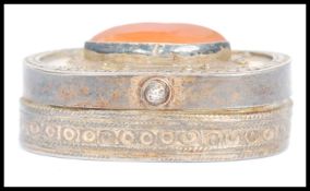 A vintage Kazakhstan silver gilt and Carnelian snuff box from Russian central Asia, fitted with a