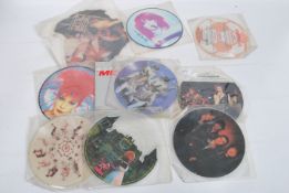 A group of vintage vinyl record picture discs to include The Members, Ashes and Stars, Juluka,