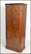 A vintage 1930s Art Deco oak bachelors single wardrobe, having geometric and stud finish to the