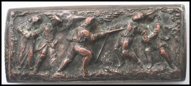 A 19th century brass vesta case match strike depicting an execution battle scene in the style of a
