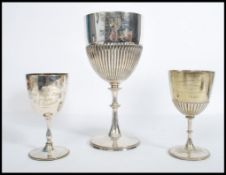 A group of three silver plated 19th century Victorian goblet trophies to include Trinity College