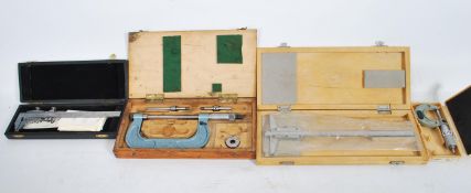 A collection of vintage tools to include engineering tools in case, depth measures, micrometers,