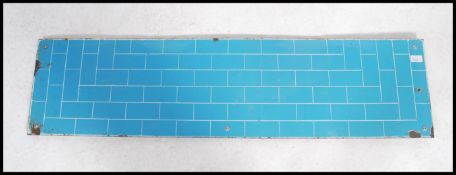 A vintage early 20th century enamel / splashback w