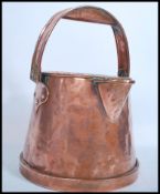 A stunning 19th century large copper Barge Ware hot water carrier / can, swing carry handle atop