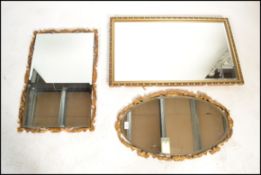 A 20th century large gilt mirror of contemporary form together with 2 further gilded 20th century