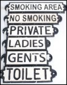 A collection of six vintage style cast metal wall / door  plaques in the manner of Worboys to