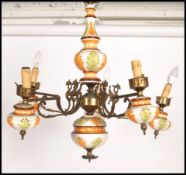 A 20th century Continental five branch brass / ormolu and ceramic light / chandelier light