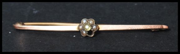 Two vintage early 20th century 9ct gold brooches. One being of crescent moon shape with engraved