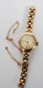 A 20th century  ladies 9ct gold cased bracelet watch by Rotary, having quartz movement set to a