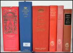 A collection of books to include Burke's dormant and extinct peerages, Burke's Royal Families of the