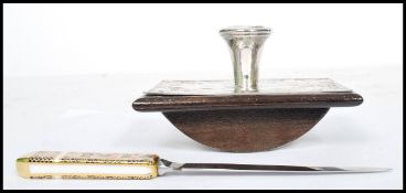 An early 20th century silver white metal desk ink blotter together with a Royal crown Derby Imari