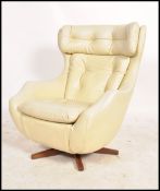 A vintage retro 20th century 1960's Parker Knoll large batwing swivel egg chair - armchair being