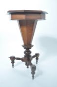 A 19th century Victorian oak trumpet shaped work box - games table.