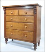 A Victorian mahogany Scottish chest of drawers being raised on turned legs with short and deep