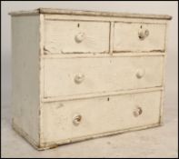 A Victorian 19th century painted  pine two over two cottage chest of drawers, two short drawers over