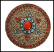 A vintage 20th century white metal / silver gilt and Turquoise trinket pot / box of circular form,