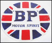 A vintage style cast metal point of sale advertising wall plaque for BP / British Petroleum. The