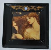 An unusual framed Art Nouveau style metal tile having a portrait study of a young lady being set