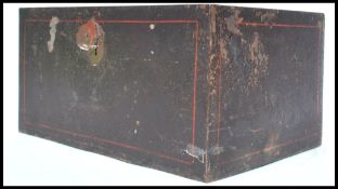 An early century heavy cast iron strong box, panelled sides, brass drop swag carry handles to