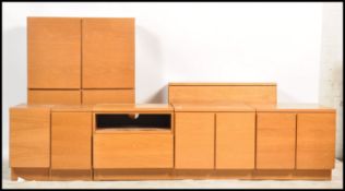 A selection of retro teak wood modular sectional Tapley wall and floor units / cabinets, the units