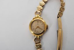 A 20th century  ladies 9ct gold cased bracelet watch by Tudor, having wind up movement set to a