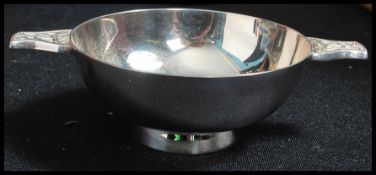 A silver Edinburgh hallmarked double handles bowl, the handles with Celtic scrolls, Edinburgh