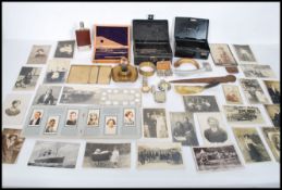 A good group of vintage 20th century items to include money tins, one with vintage padlock, hip