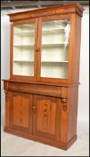 A good Victorian pitch pine and mahogany country dresser - cabinet. The base raised on plinth base