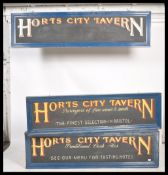 A set of 3 large 20th century external painted wooden advertising signs for Horts City Tavern Pub.