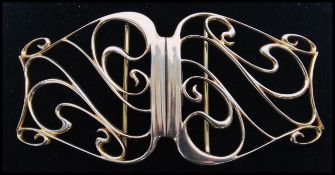 An early 20th century Victorian hallmarked 9ct gold nurses nurse belt buckle clasp having a