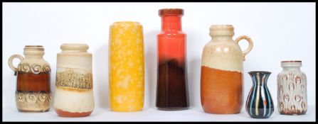 A group of mid 20th century West German ceramic vases to include fat lava example. Each stamped to