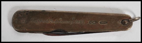 A silver hallmarked pocket fruit knife by George Ibberson & Co, Sheffield 1951. The knife with