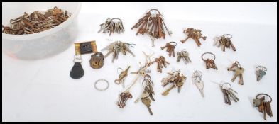 A good large collection of vintage and antique keys to include furniture and door keys, please refer