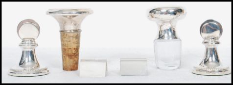 A collection of silver hallmarked items to include place name stands ( two pairs ) and two silver