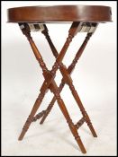 A contemporary antique Georgian style revival butlers tray and stand. The coaching stand of bobbin