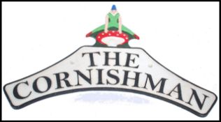 A vintage style cast metal sign in the manner of Warboys for The Cornishman wall plaque, the