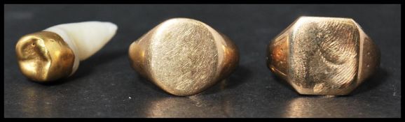 Two vintage hallmarked 9ct gold signet rings along with a gold tooth. The signet rings having