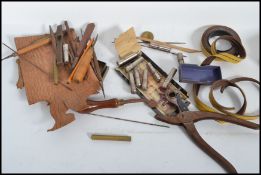 A group of antique leather working tool dating from the 19th century to include hole punch,