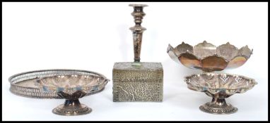 A collection of silver plated wares to include an Arts & Crafts hammered trinket box of