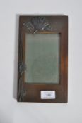 A stunning 19th / 20th century Art Nouveau oak picture frame with an applied flower running up one