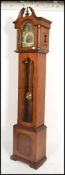 A 20th century mahogany Tempus Fugit longcase clock with silvered dial marked for ECS Westminster