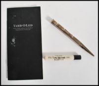 A vintage sterling silver yard o led silver pencil of larger form complete with pouch, handbook