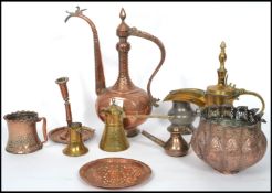 A good collection of 19th and 20th century Middle Eastern brass, copper and bronze items to