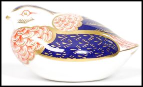 A Royal Crown Derby Partridge paperweight, with red stamp to underside, silver stopper, 5.5cm high x
