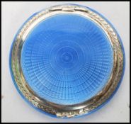 A stunning silver and enamel compact marked Peri 595, London assay marks, dating to 1929, makers