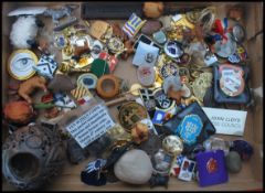 A collection of curios to include many enamel badges ranging from horse interest to Journalism,