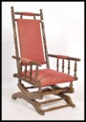 A Victorian mahogany aesthetic movement Boston Rocker - American Rocking chair. Raised on sleigh
