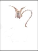 A 20th century silver plated and crystal glass claret jug of hexagonal form having faceted glass